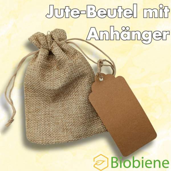 Jutebeutel-mit-Kordelzug-und-Kraftpapier-Anhängern-als-umweltfreundlicher-Verpackung